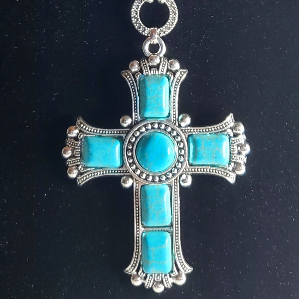 Faux Turquoise cross fashion necklace.